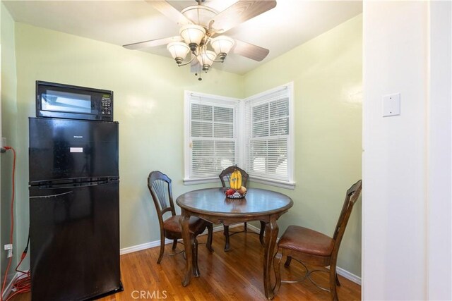 3766 Rose Ave, Long Beach, CA 90807 - dining space featuring wood finished floors and ceiling fan