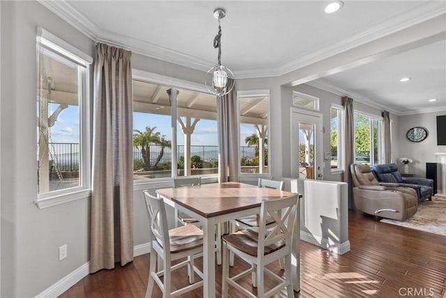 20704 Campania Ln, Porter Ranch, CA 91326 - dining space with dark wood-style floors, recessed lighting, and crown molding