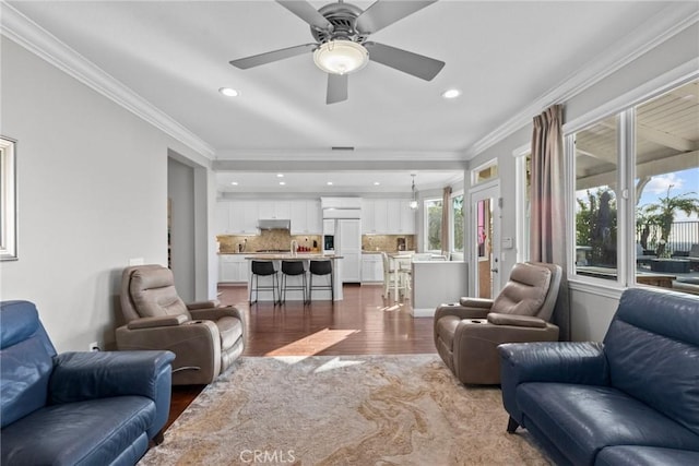 20704 Campania Ln, Porter Ranch, CA 91326 - living room featuring dark wood-style flooring, recessed lighting, crown molding, and a ceiling fan