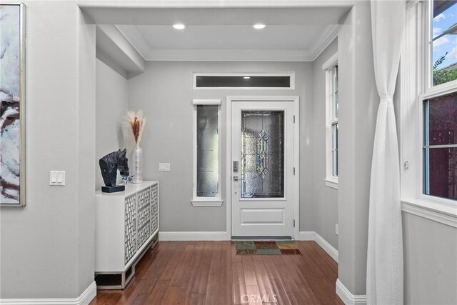 20704 Campania Ln, Porter Ranch, CA 91326 - entryway with ornamental molding and dark wood-style floors