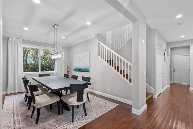 20704 Campania Ln, Porter Ranch, CA 91326 - dining area with stairs, hardwood / wood-style floors, recessed lighting, a chandelier, and ornamental molding