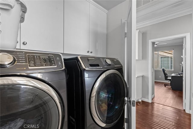 20704 Campania Ln, Porter Ranch, CA 91326 - laundry area featuring washer and clothes dryer, cabinet space, wood finished floors, crown molding, and a desk