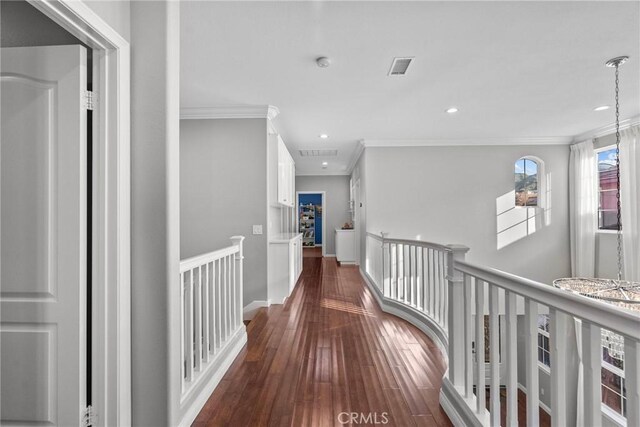 20704 Campania Ln, Porter Ranch, CA 91326 - corridor with an upstairs landing, dark wood finished floors, crown molding, and recessed lighting
