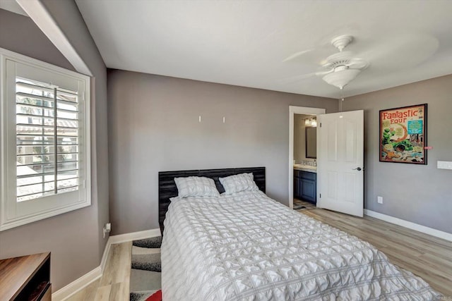 36485 Carney Rd, Valley Center, CA 92082 - bedroom featuring light wood finished floors, connected bathroom, and ceiling fan