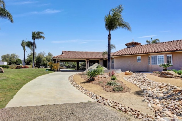 36485 Carney Rd, Valley Center, CA 92082 - ranch-style home with stucco siding, a tiled roof, a front yard, and concrete driveway