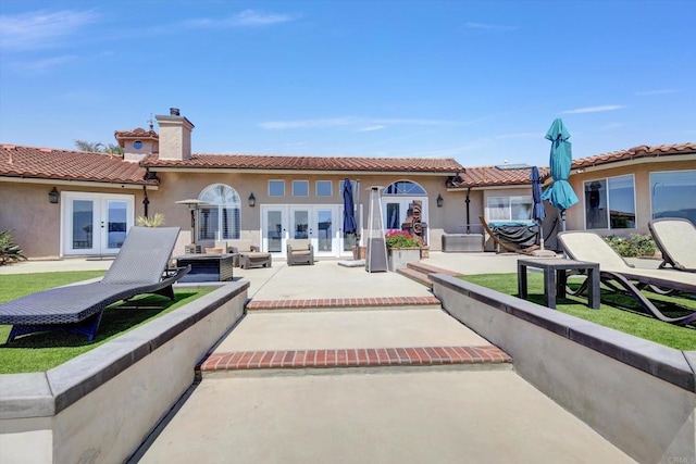 36485 Carney Rd, Valley Center, CA 92082 - back of house with french doors, a chimney, stucco siding, and a tile roof