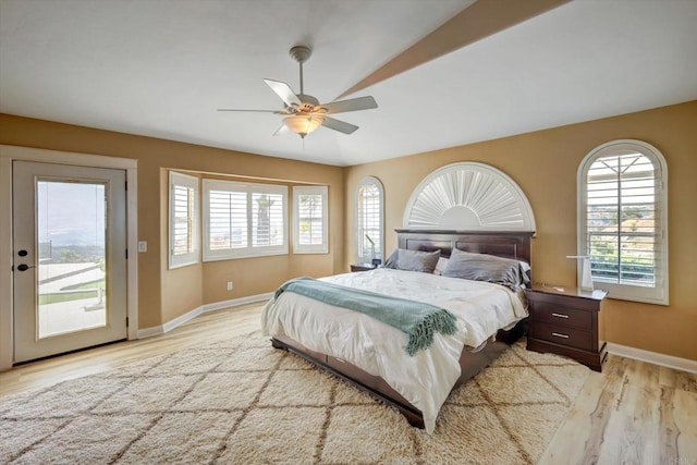 36485 Carney Rd, Valley Center, CA 92082 - bedroom with access to exterior, multiple windows, light wood-style flooring, and ceiling fan