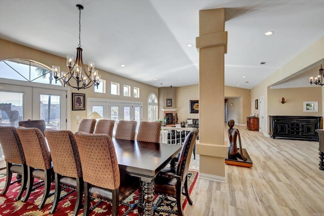 36485 Carney Rd, Valley Center, CA 92082 - dining space featuring a chandelier, french doors, light wood finished floors, vaulted ceiling, and recessed lighting