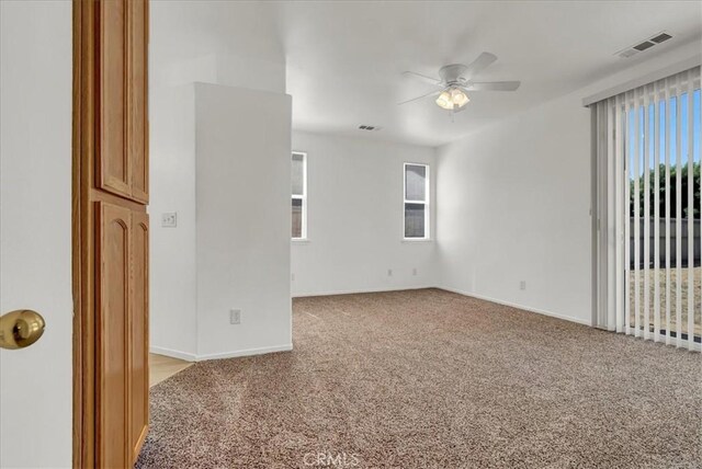 2508 Goldridge St, Selma, CA 93662 - unfurnished room featuring ceiling fan, light carpet, and plenty of natural light