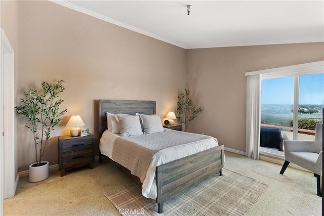 2175 Pacific Ave Unit E4, Costa Mesa, CA 92627 - bedroom featuring light colored carpet, crown molding, and access to exterior