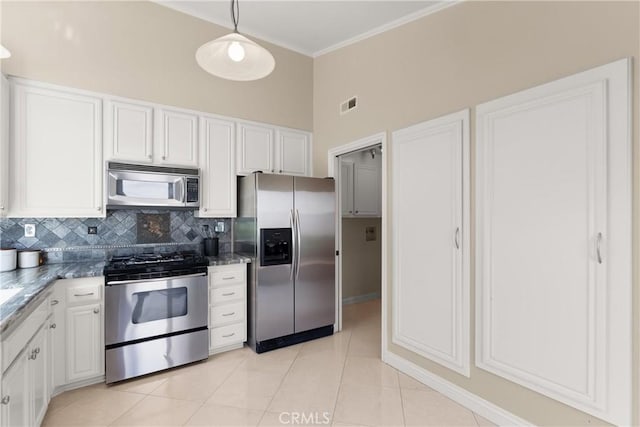 2175 Pacific Ave Unit E4, Costa Mesa, CA 92627 - kitchen featuring stainless steel appliances, decorative backsplash, white cabinets, crown molding, and a high ceiling