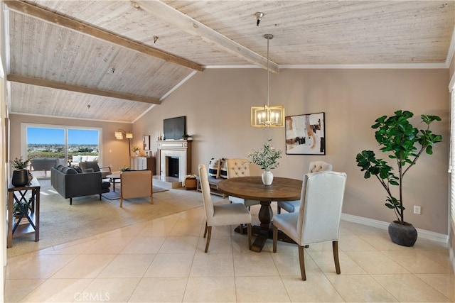 2175 Pacific Ave Unit E4, Costa Mesa, CA 92627 - dining space with wood ceiling, a fireplace with raised hearth, light tile patterned floors, and a chandelier