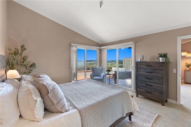 2175 Pacific Ave Unit E4, Costa Mesa, CA 92627 - bedroom featuring access to exterior, lofted ceiling, crown molding, and light colored carpet