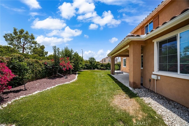 1568 Patterson Ranch Rd, Redlands, CA 92374 - view of grassy yard with a patio area