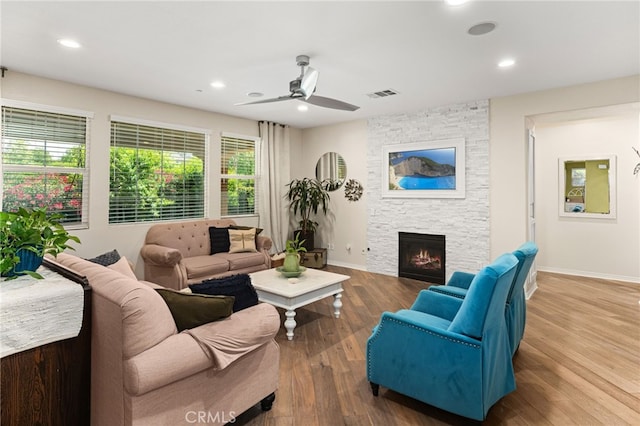 1568 Patterson Ranch Rd, Redlands, CA 92374 - living room featuring a stone fireplace, a ceiling fan, wood finished floors, and recessed lighting