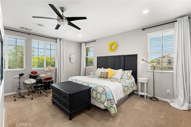 1568 Patterson Ranch Rd, Redlands, CA 92374 - bedroom featuring light carpet, multiple windows, recessed lighting, and ceiling fan