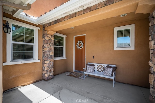 1568 Patterson Ranch Rd, Redlands, CA 92374 - property entrance featuring stucco siding and stone siding