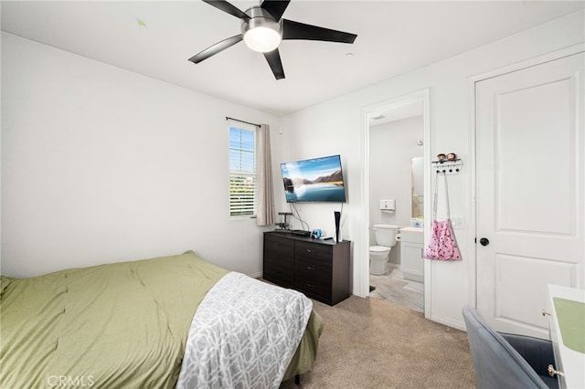 1568 Patterson Ranch Rd, Redlands, CA 92374 - bedroom featuring light carpet, connected bathroom, and ceiling fan