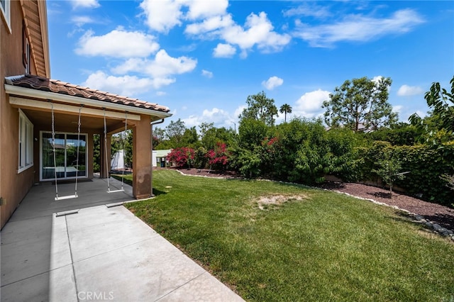 1568 Patterson Ranch Rd, Redlands, CA 92374 - view of green lawn with a patio area