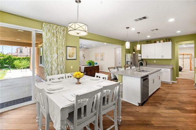1568 Patterson Ranch Rd, Redlands, CA 92374 - dining room featuring wood finished floors and recessed lighting