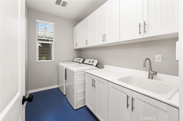 1568 Patterson Ranch Rd, Redlands, CA 92374 - laundry area featuring washing machine and dryer and cabinet space