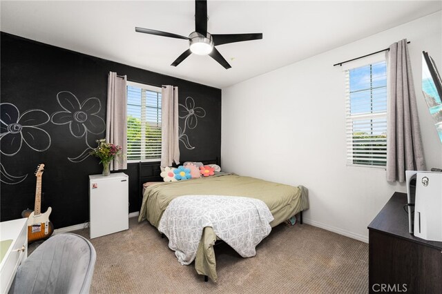 1568 Patterson Ranch Rd, Redlands, CA 92374 - carpeted bedroom featuring baseboards and a ceiling fan