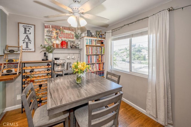1134 N Rowan Ave, East Los Angeles, CA 90063 - dining room featuring ceiling fan and wood finished floors