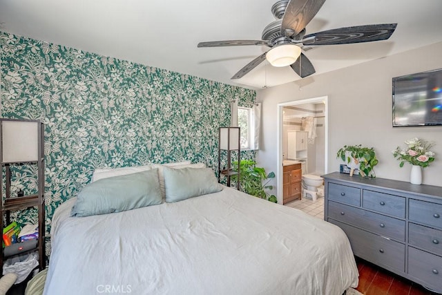 1134 N Rowan Ave, East Los Angeles, CA 90063 - bedroom with wallpapered walls, ensuite bathroom, ceiling fan, and wood finished floors