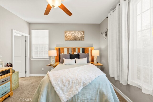 46287 Durango Dr, Temecula, CA 92592 - carpeted bedroom with baseboards and ceiling fan