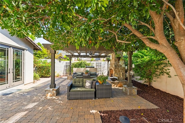 46287 Durango Dr, Temecula, CA 92592 - fenced backyard featuring french doors, a pergola, an outdoor living space, and a patio area
