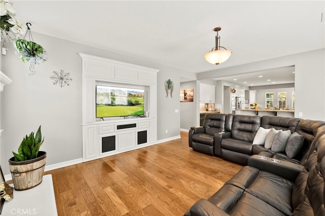 46287 Durango Dr, Temecula, CA 92592 - living room featuring light wood-style flooring and recessed lighting