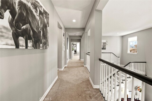 46287 Durango Dr, Temecula, CA 92592 - hallway with an upstairs landing, carpet, and recessed lighting