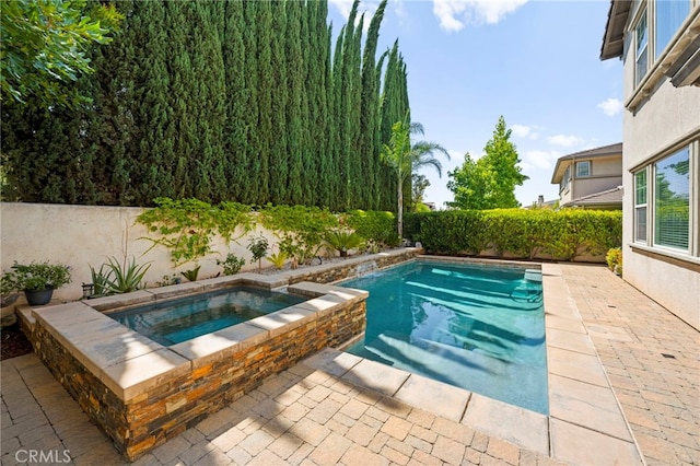 46287 Durango Dr, Temecula, CA 92592 - view of pool featuring an in-ground hot tub, a patio, and a fenced backyard