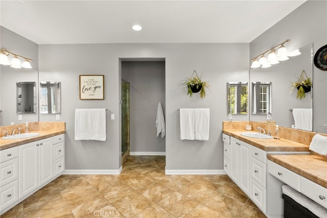 46287 Durango Dr, Temecula, CA 92592 - full bath featuring two vanities and a stall shower
