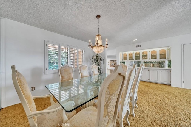2591 Braided Mane Dr, Diamond Bar, CA 91765 - dining area with light carpet, a chandelier, and a textured ceiling