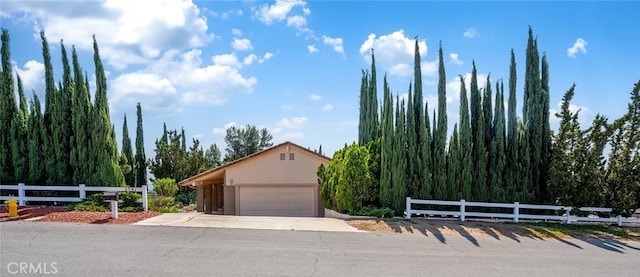 2591 Braided Mane Dr, Diamond Bar, CA 91765 - obstructed view of property featuring stucco siding