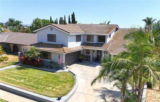 3380 E Date St, Brea, CA 92823 - view of front of home with an attached garage, stucco siding, driveway, and a tiled roof
