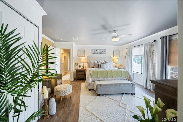 3380 E Date St, Brea, CA 92823 - bedroom featuring crown molding, wood finished floors, and a ceiling fan