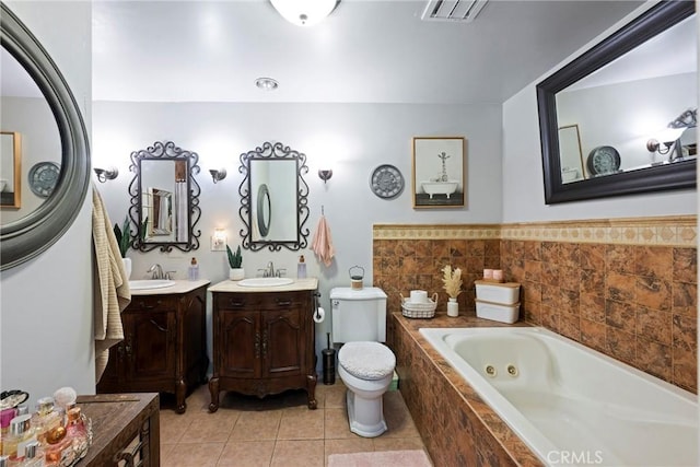 3380 E Date St, Brea, CA 92823 - full bath featuring a tub with jets, tile patterned flooring, two vanities, and a wainscoted wall
