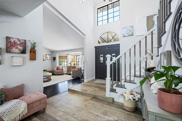 3380 E Date St, Brea, CA 92823 - foyer entrance featuring wood finished floors, stairs, and a high ceiling