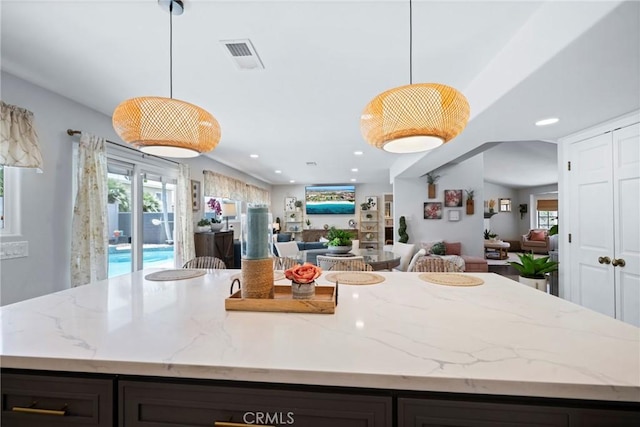 3380 E Date St, Brea, CA 92823 - kitchen featuring open floor plan, recessed lighting, light stone counters, and healthy amount of natural light