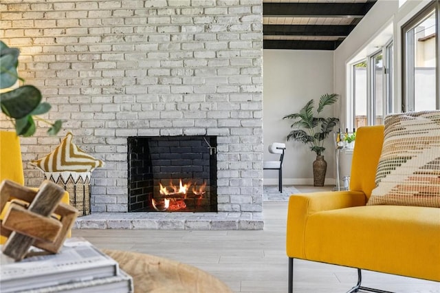 820 Robin Ln, Millbrae, CA 94030 - living area featuring a fireplace, beamed ceiling, and wood finished floors