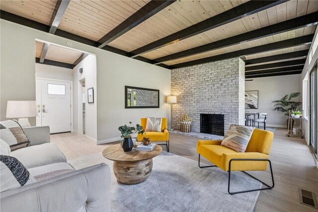 820 Robin Ln, Millbrae, CA 94030 - living area with light wood finished floors, a wood ceiling with exposed beams, and a fireplace