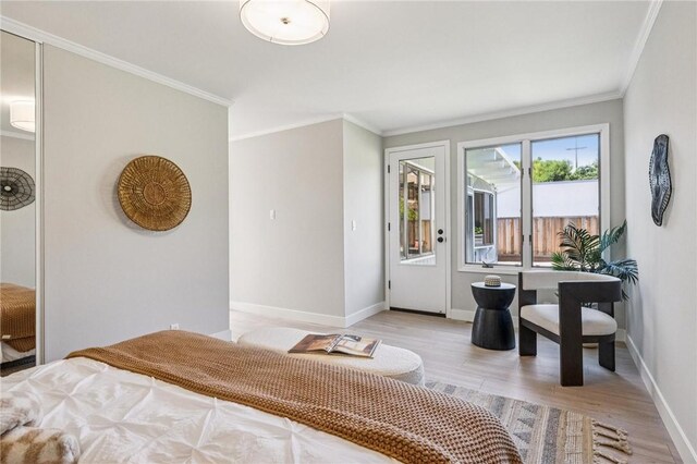 820 Robin Ln, Millbrae, CA 94030 - bedroom with light wood finished floors, crown molding, and access to outside