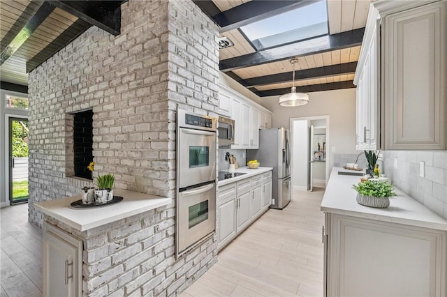820 Robin Ln, Millbrae, CA 94030 - kitchen with stainless steel appliances, a wooden ceiling with exposed beams, tasteful backsplash, light wood-style flooring, and light countertops