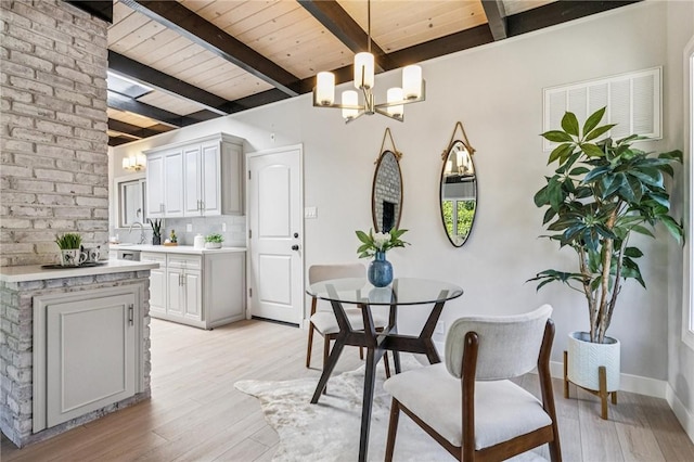 820 Robin Ln, Millbrae, CA 94030 - dining area with a chandelier, light wood finished floors, and a wooden ceiling with exposed beams