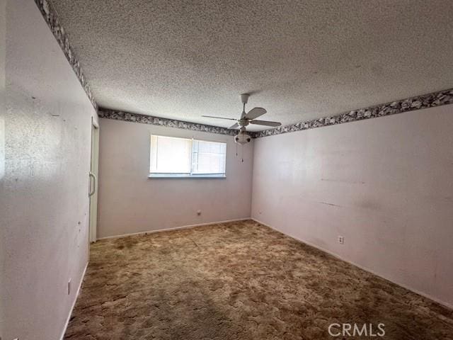 3246 Shamrock Ave, Merced, CA 95340 - carpeted empty room featuring a ceiling fan and a textured ceiling