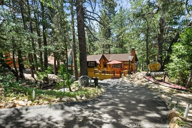 33019 Juniper Ln, Green Valley Lake, CA 92341 - rustic home with a chimney and driveway