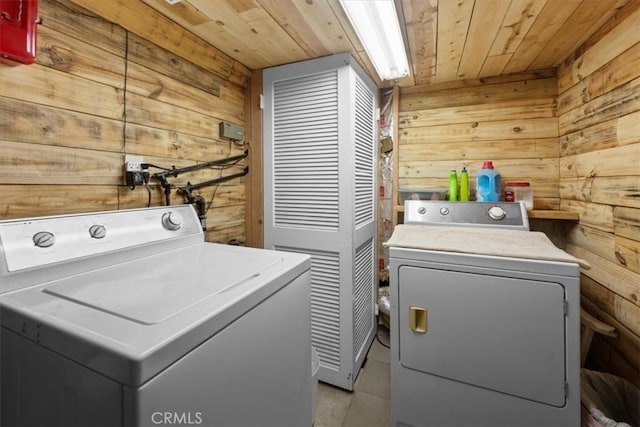 33019 Juniper Ln, Green Valley Lake, CA 92341 - laundry room with washing machine and clothes dryer, wooden walls, and wooden ceiling