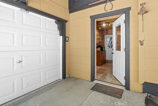 33019 Juniper Ln, Green Valley Lake, CA 92341 - property entrance with a garage